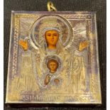A miniature Russian silver gilt icon, the Virgin Mary with child, velvet backed, suspension loop,