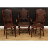 A set of five Fischel bentwood chairs, comprising four side chairs and an armchair, the backs