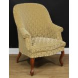 An early 20th century French walnut crapaud armchair, 101cm high, 79cm wide, the seat 49cm wide