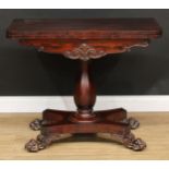 A William IV rosewood card table, fault to hinges, panelled baluster column, incurve base, paw feet,