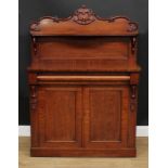 A Victorian mahogany chiffonier, shaped back with serpentine shelf carved and applied with C-scrolls