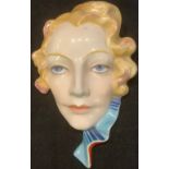 A Czechoslovakian hand painted Art Deco wall mask