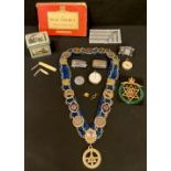 A Masonic collar with assorted badges, Sussex, Grand Lodge, others; a Buffalo pin and cloth badge; a