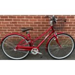 A lady's Pinnacle Californium Two aluminium bicycle, in red, with basket