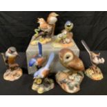 A Royal Crown Derby painted model group of Thrush Chicks; others, Owl, Long Tailed Tit (boxed),