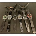 A collection of black faced fashion wristwatches, including Prince London, Kahuna, etc (8)
