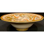 A Crown Ducal Charlotte Rhead tube lined bowl, in shades of orange and brown, 25.5cm diameter,