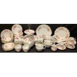 A Royal Crown Derby Posies pattern tea service for twelve comprising bachelor's teapot, cream