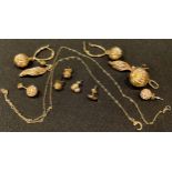 A 9ct gold spherical pendant, five pairs of 9ct gold earrings, a chain, 5.4g gross