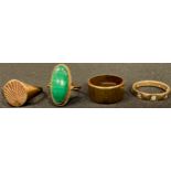 A 9ct gold bark effect ring, size O/P; other 9ct gold rings, including malachite, 17.5g gross (4)