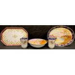 A Noritake oval dressing table tray, painted with a calm waterway, 32cm wide; a pair of Noritake