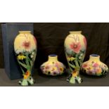 A pair of Old Tupton Ware tube lined compressed ovoid vases, decorated with summer flowers, 17cm