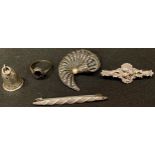 A silver marcasite scroll brooch, set with a single pearl, marked 925; a silver shamrock brooch; a