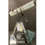 A Meade electronic telescope with tripod and other accessories