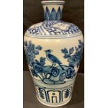 A Chinese blue and white inverted baluster shoulder vase, painted with birds and insects in a