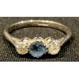 A platinum diamond and sapphire three stone ring, size N, 2.9g