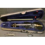 An electric violin, in black, carry case