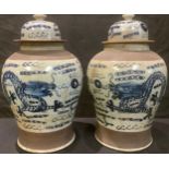 A pair of Chinese blue and white crackle glaze temple jars, painted with dragons chasing pearl of