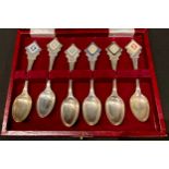 A set of six silver teaspoons, each lozenge shape terminal set with a miniature Wedgwood