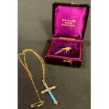 A late 19th century 9ct gold chain, with a gold plated and blue glass cross pendant, safety chain,