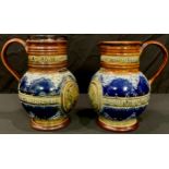 A pair of Doulton Lambeth ovoid jugs, Queen Victoria Jubilee 1897, one with silver rim, London 1897