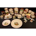 A collection of 'motto' ware including butter dish, jugs, miniature teapot etc (approximately 27