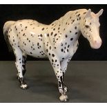 A Beswick Appaloosa (spotted walking pony), model no. 1516, designed by Arthur Gredington, 13.5cm