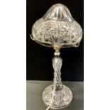 A cut glass mushroom lamp, shaped shade, faceted column, circular foot, 42.5cm high
