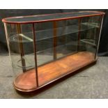 A late 19th / early 20th century glass D-end shop display cabinet, 169.5cm x 46cm x 95cm tall.
