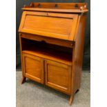 An early 20th century mahogany student's bureau, 112cm tall x 80.5cm wide x 32cm deep.