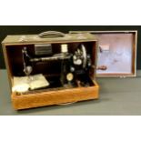 A Singer hand operated sewing machine, Model 33653, serial no EB881124, cased