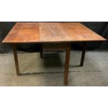 A George III drop-leaf oak kitchen / dining table, 107cm x 40cm (107cm x 120cm with leaves open) x