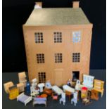 A three story doll house, 80cm high , 59cm wide, 31.5cm deep, six room interior with assorted