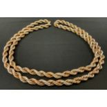 A 9ct gold multi tone heavy weight rope twist necklace, stamped 375, 80cm long, 136.6g