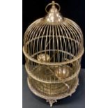 A brass birdcage, pierced base, 45cm high, 30cm diameter