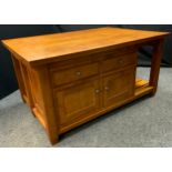 A large hand crafted oak kitchen island, pair of cupboard doors, two drawers and open shelf, 80cm