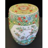 A 20th century Chinese Famille vert barrel seat, decorated with traditional panels, green and yellow