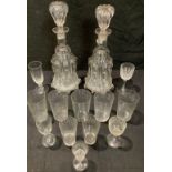 A pair of clear glass mallet shaped decanters, conforming stoppers, late 19th century; assorted
