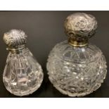 A silver mounted cut glass dressing table scent bottle, hinged cover, glass stopper, Birmingham