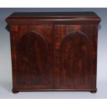 A William IV mahogany table cabinet, moulded rectangular top above a pair of rectangular doors