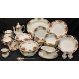 A Royal Albert Old Country Roses dinner service, comprising eight dinner plates, eight dessert