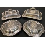 A pair of early 20th century entree dishes; a Walker & Hall entree dish; another similar (4)