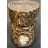 A 19th century French novelty inkwell, as a tree trunk, inscribed Menton and mounted with a cameo