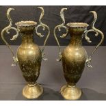 A pair of Anglo-Indian brass two handled baluster vases, in the Bidri manner, early 20th century