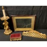 A giltwood and red velvet clock stand, 21cm wide, 19th century; a gesso picture frame, in a glazed