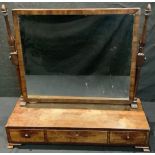 A 19th century rectangular mahogany dressing mirror, rectangular base with three small drawers, 58.