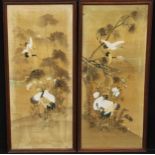 A pair of Japanese nihon shishu pictures, embroidered and painted with storks, foliage and Mount