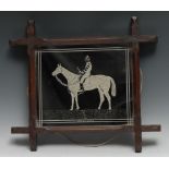 Folk Art - a late 19th century novelty equestrian looking-glass, the rectangular mirror plate
