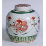 A Chinese ovoid ginger jar and cover, painted in polychrome enamels with phoenix and dragons