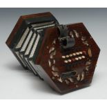 A Victorian rosewood concertina, by C. Wheatstone, London, forty-eight buttons, some with musical